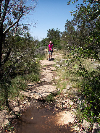 Hiker on  Gorman Falls Trail Colorado Bend SP TX