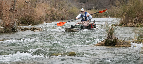 Kayaker on S. Llano River TX