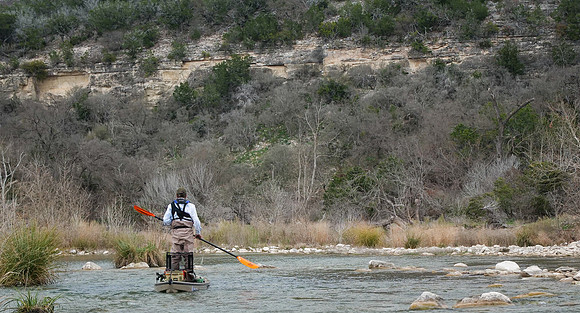Kayaker on S. Llano River TX