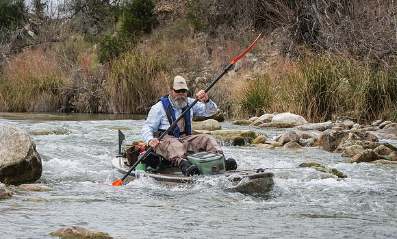 Kayaker on S. Llano River TX