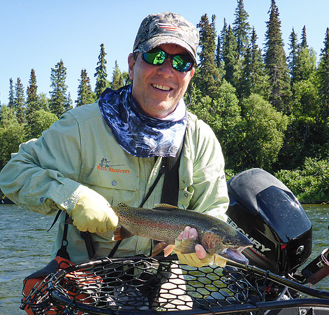 Even the guy in the back of the boat catches !
