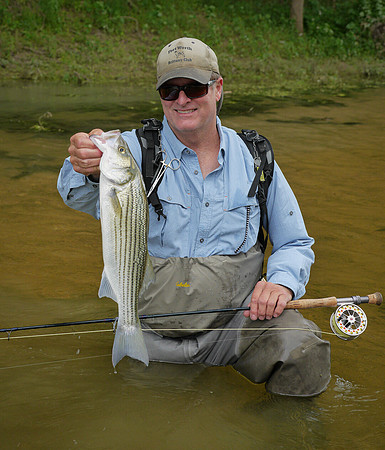 Craig Rucker with Nolan River Striper