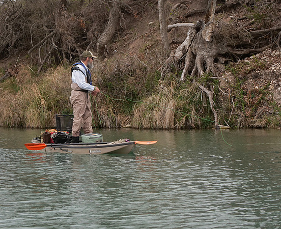 Fly Angler in Kayak South Llano River TX