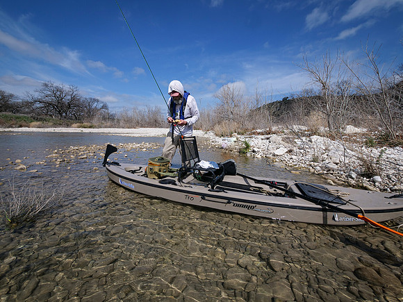 Rex ties on a fly South Llano River TX