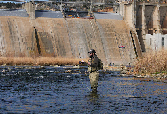 Fly angler at Morris Sheppard Dam Brazos River